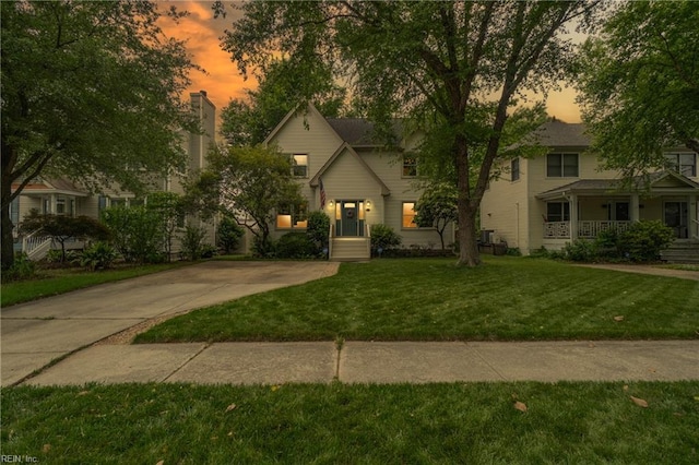 411 Rhode Island Ave, Norfolk, VA 23508 - obstructed view of property with a yard