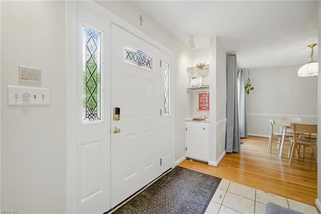 411 Rhode Island Ave, Norfolk, VA 23508 - entryway with healthy amount of natural light, light tile patterned flooring, and baseboards