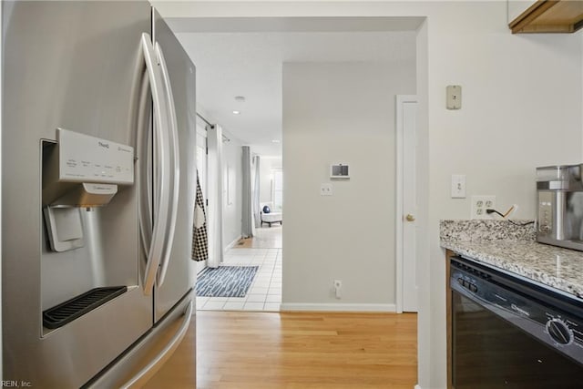 411 Rhode Island Ave, Norfolk, VA 23508 - kitchen featuring stainless steel fridge, dishwasher, light wood-style flooring, light stone countertops, and baseboards