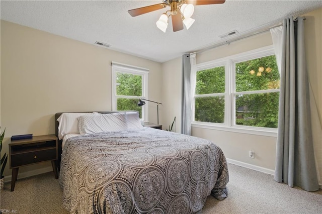 411 Rhode Island Ave, Norfolk, VA 23508 - carpeted bedroom with baseboards, a textured ceiling, and a ceiling fan