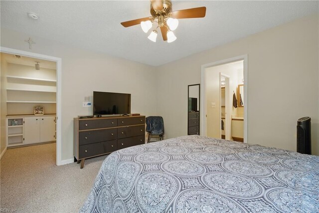 411 Rhode Island Ave, Norfolk, VA 23508 - carpeted bedroom featuring a ceiling fan, ensuite bath, and baseboards
