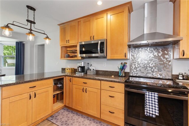 216 Stubbs Dr, Chesapeake, VA 23323 - kitchen featuring wall chimney exhaust hood, stainless steel appliances, a peninsula, dark stone countertops, and recessed lighting