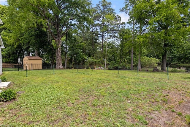 216 Stubbs Dr, Chesapeake, VA 23323 - view of yard with an outbuilding and a storage shed