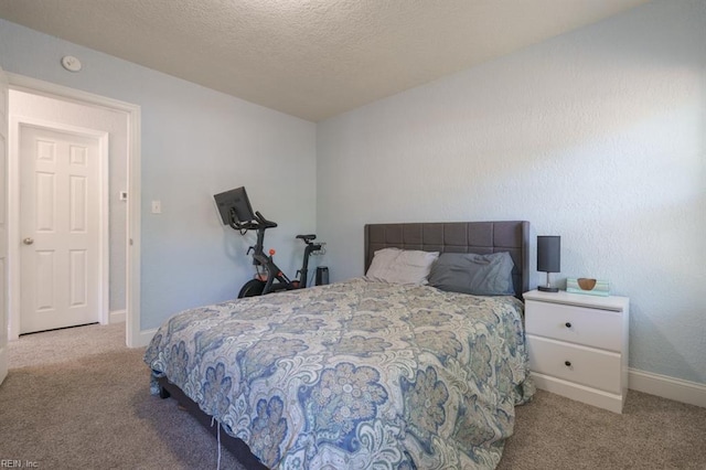 310 Manteo Ave, Hampton, VA 23661 - bedroom featuring carpet floors, baseboards, and a textured ceiling