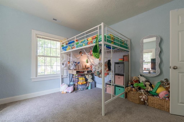 310 Manteo Ave, Hampton, VA 23661 - bedroom featuring carpet floors, baseboards, and a textured ceiling