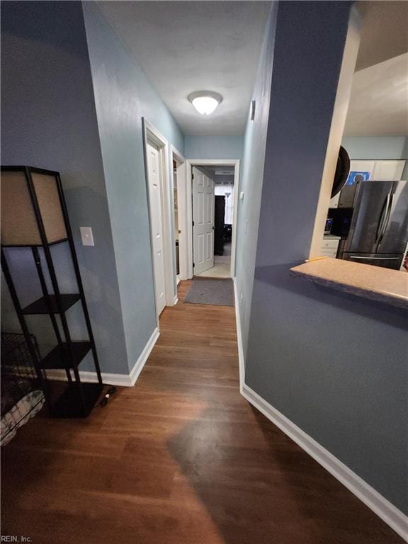 515 Burton St, Hampton, VA 23666 - hallway with baseboards and wood finished floors