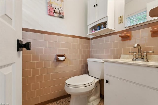 1815 Meadowview Dr, Yorktown, VA 23693 - bathroom with tile walls, toilet, and vanity