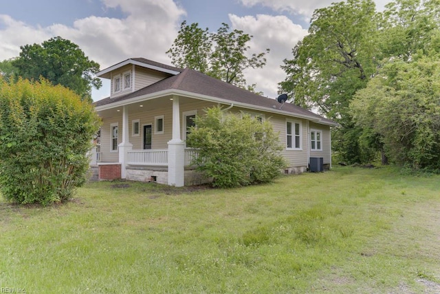 208 George Washington Hwy N, Chesapeake, VA 23323 - view of front of home with covered porch, central AC, and a front lawn
