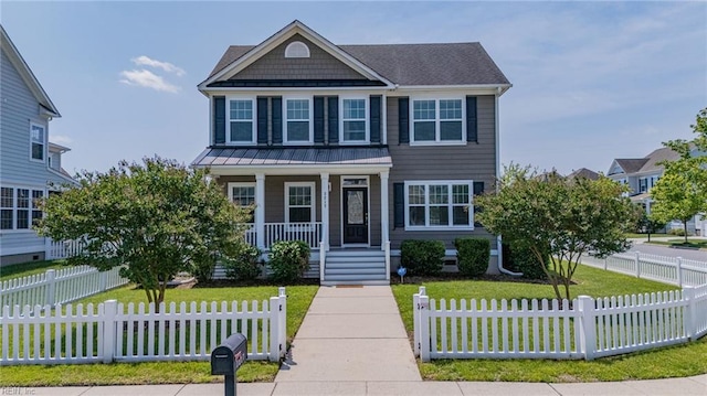 3217 Meanley Dr, Chesapeake, VA 23323 - view of front of house featuring a porch, a standing seam roof, and metal roof