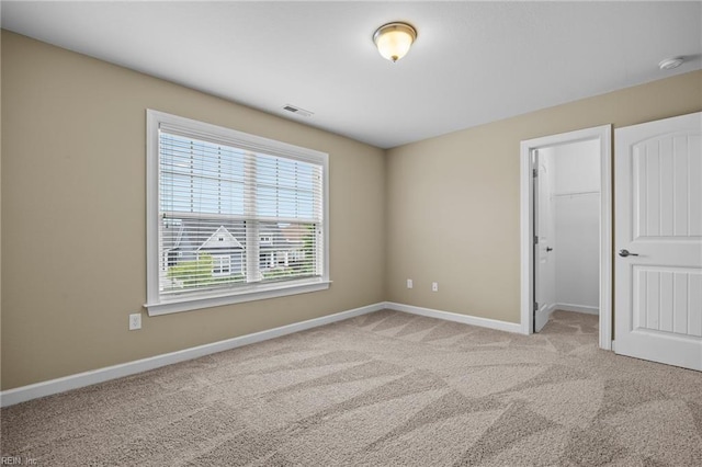 3217 Meanley Dr, Chesapeake, VA 23323 - unfurnished bedroom with carpet floors, baseboards, a spacious closet, and a closet