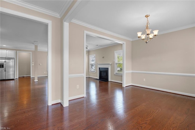 3217 Meanley Dr, Chesapeake, VA 23323 - empty room featuring a chandelier, dark wood-style flooring, crown molding, and baseboards