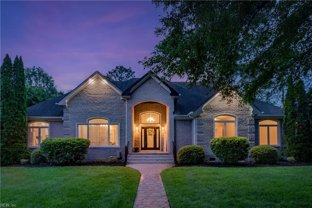 2300 Perez Way, Virginia Beach, VA 23456 - french country inspired facade featuring a yard, brick siding, and roof with shingles