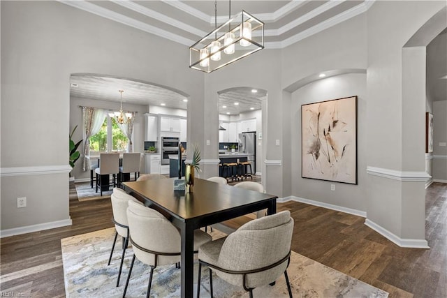 2300 Perez Way, Virginia Beach, VA 23456 - dining space with a chandelier, arched walkways, dark wood-style floors, ornamental molding, and baseboards