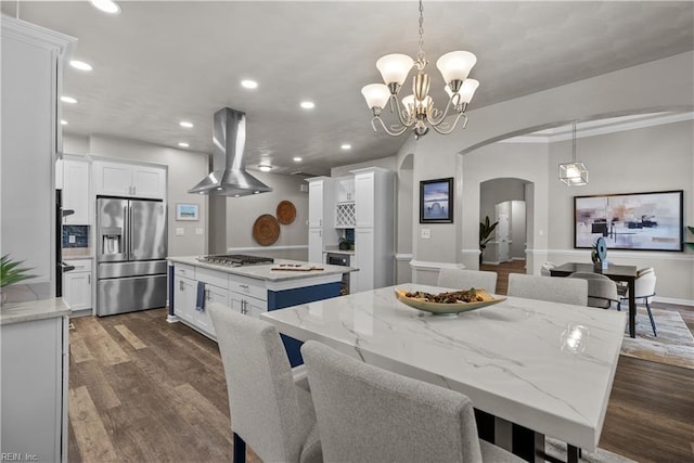 2300 Perez Way, Virginia Beach, VA 23456 - dining area with arched walkways, recessed lighting, dark wood-style floors, a chandelier, and baseboards
