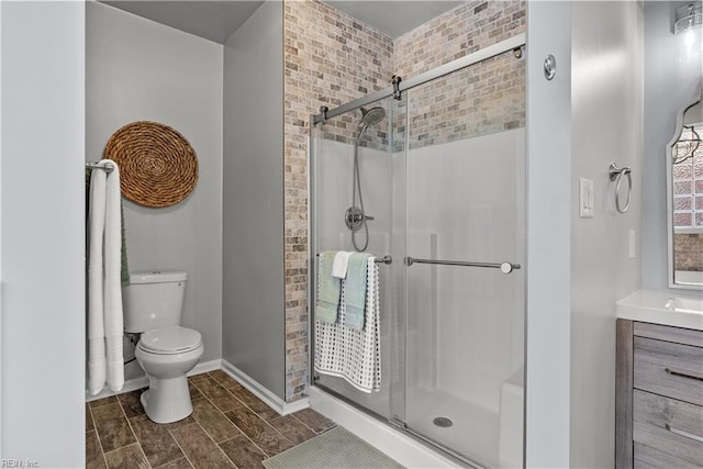 2300 Perez Way, Virginia Beach, VA 23456 - bathroom with a stall shower, toilet, vanity, and baseboards
