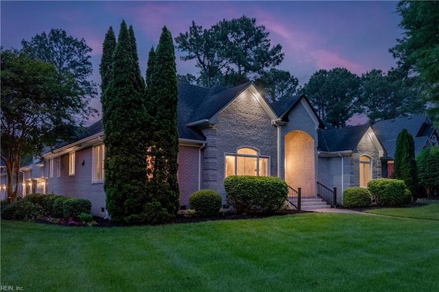 2300 Perez Way, Virginia Beach, VA 23456 - view of front facade with brick siding, a front yard, and a shingled roof