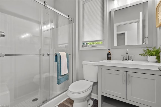 2300 Perez Way, Virginia Beach, VA 23456 - bathroom featuring toilet, vanity, a shower stall, and baseboards