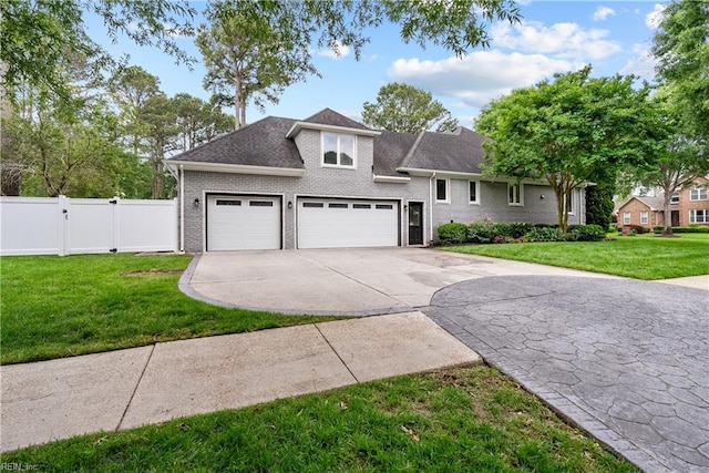 2300 Perez Way, Virginia Beach, VA 23456 - view of front of house with brick siding, driveway, a gate, and roof with shingles