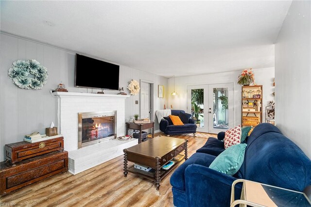 4769 Marlborough Dr, Virginia Beach, VA 23464 - living area with french doors, a fireplace, and wood finished floors