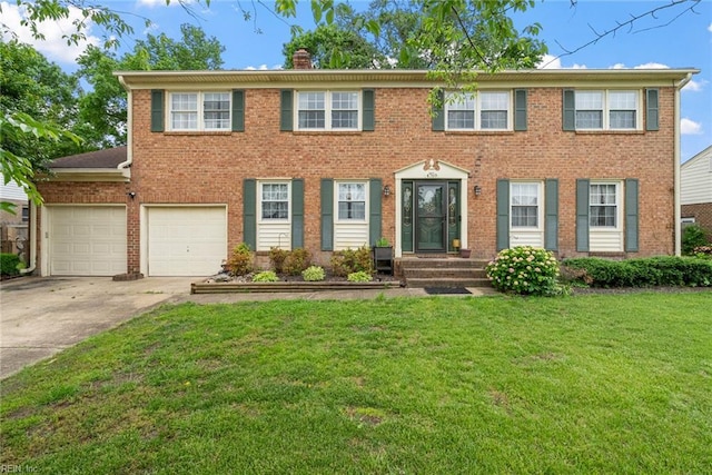 4769 Marlborough Dr, Virginia Beach, VA 23464 - colonial house featuring driveway, a front yard, brick siding, and a chimney