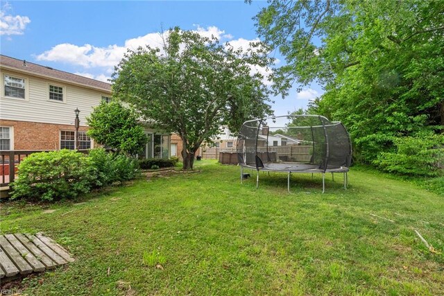 4769 Marlborough Dr, Virginia Beach, VA 23464 - view of green lawn with a trampoline