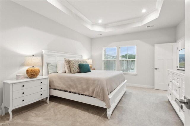 109 Big Woods Dr, Poquoson, VA 23662 - bedroom featuring light carpet, a tray ceiling, recessed lighting, ornamental molding, and baseboards