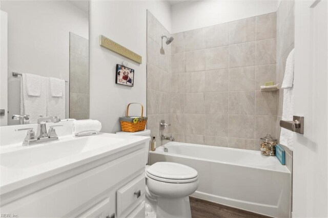 109 Big Woods Dr, Poquoson, VA 23662 - bathroom with toilet, wood finished floors, tub / shower combination, and vanity