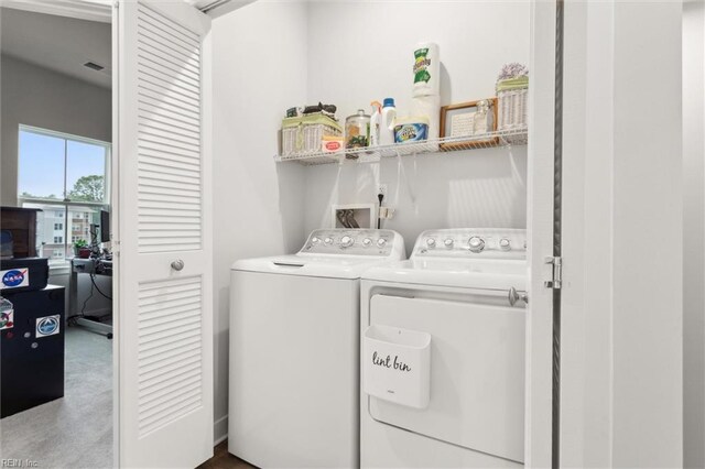 109 Big Woods Dr, Poquoson, VA 23662 - laundry area with washer and clothes dryer