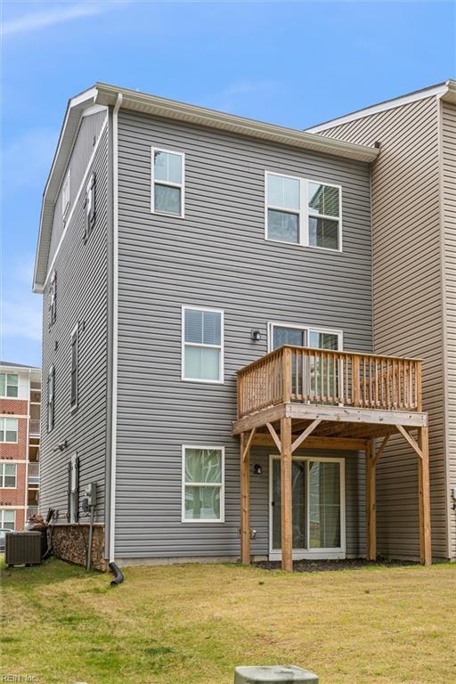 109 Big Woods Dr, Poquoson, VA 23662 - back of house featuring a yard, a deck, and central air condition unit