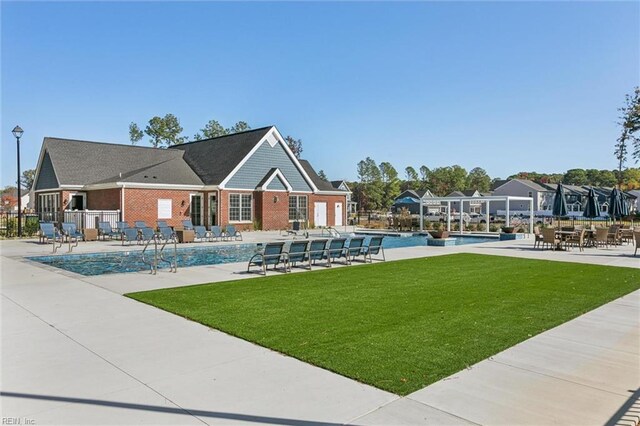 109 Big Woods Dr, Poquoson, VA 23662 - view of home's community featuring a yard, a pool, and a patio