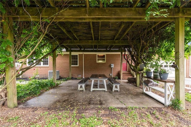 104 Beechwood Dr, Franklin, VA 23851 - view of patio / terrace with entry steps, central air condition unit, and a carport