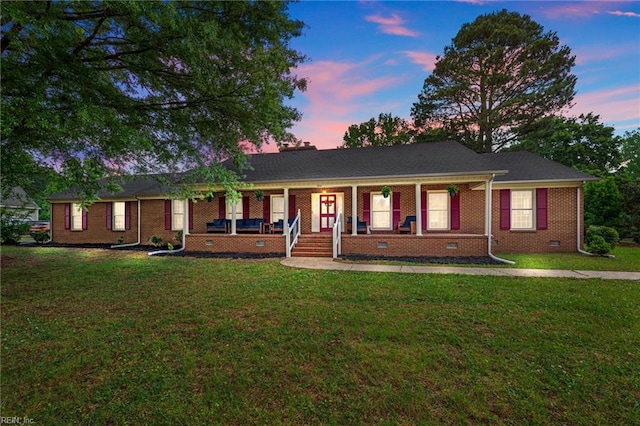 104 Beechwood Dr, Franklin, VA 23851 - ranch-style house with covered porch, a front yard, brick siding, and crawl space