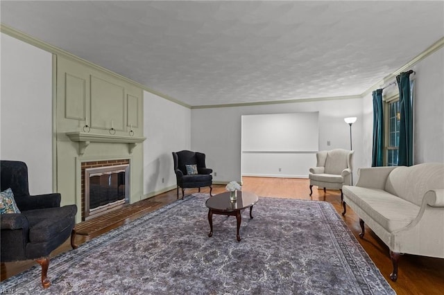 104 Beechwood Dr, Franklin, VA 23851 - living area featuring a fireplace, crown molding, and wood finished floors