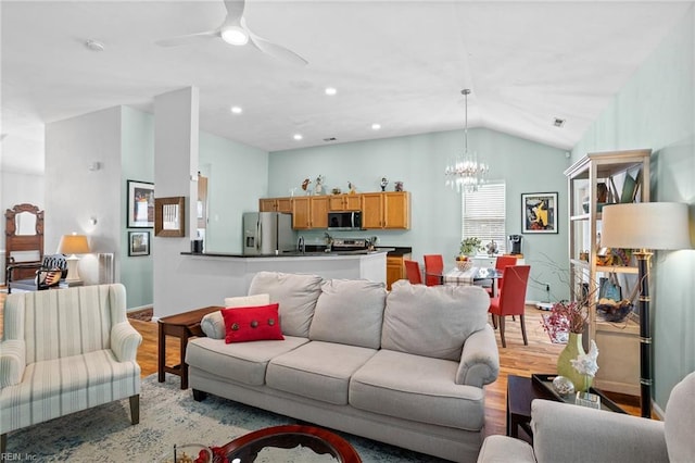 2777 Livingston Loop, Virginia Beach, VA 23456 - living room with light wood-style flooring, lofted ceiling, ceiling fan, a chandelier, and baseboards
