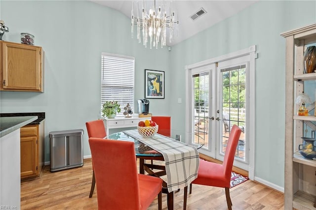 2777 Livingston Loop, Virginia Beach, VA 23456 - dining space with a chandelier, light wood-style floors, french doors, and baseboards