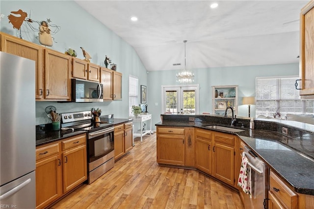 2777 Livingston Loop, Virginia Beach, VA 23456 - kitchen with appliances with stainless steel finishes, a sink, lofted ceiling, a chandelier, and light wood-style floors