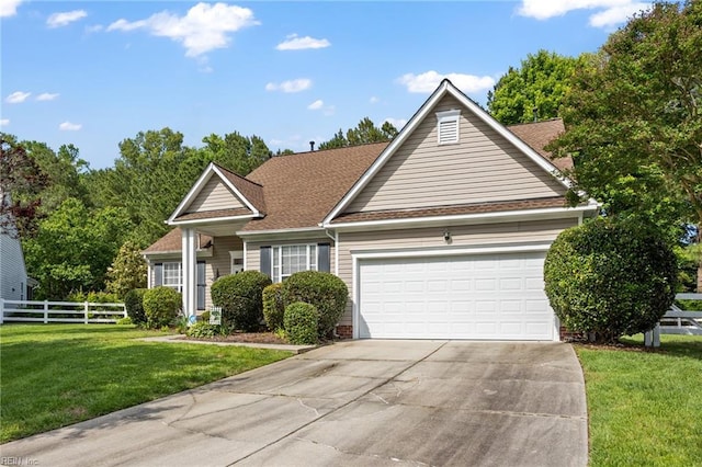 2777 Livingston Loop, Virginia Beach, VA 23456 - view of front facade featuring concrete driveway, a garage, and roof with shingles