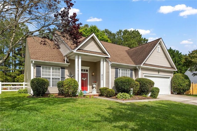 2777 Livingston Loop, Virginia Beach, VA 23456 - view of front facade featuring driveway, an attached garage, and a shingled roof
