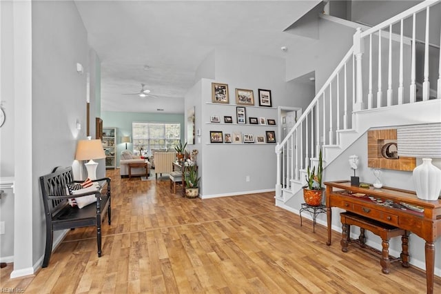 2777 Livingston Loop, Virginia Beach, VA 23456 - entryway with a ceiling fan, stairs, light wood finished floors, and baseboards
