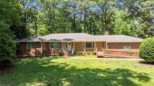 1508 Reynard Rd, Suffolk, VA 23433 - single story home featuring a chimney, a front lawn, and brick siding