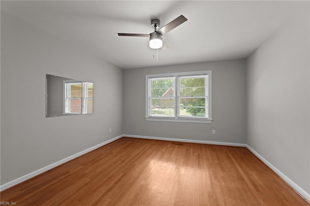1508 Reynard Rd, Suffolk, VA 23433 - empty room with light wood-style floors, baseboards, and a ceiling fan