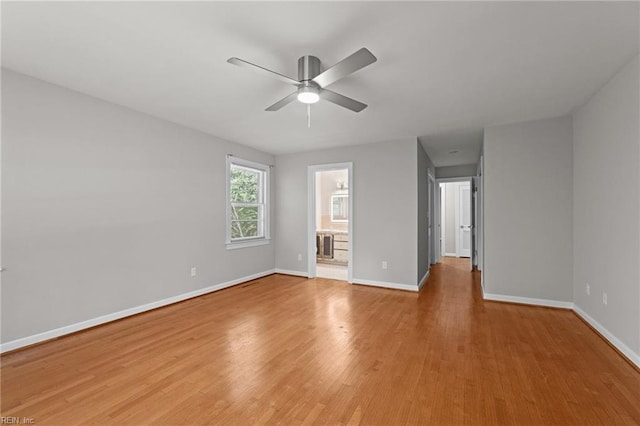1508 Reynard Rd, Suffolk, VA 23433 - unfurnished room with a ceiling fan, light wood-style flooring, and baseboards