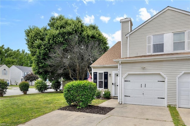 traditional-style home with a front lawn, driveway, a garage, a chimney, and a shingled roof