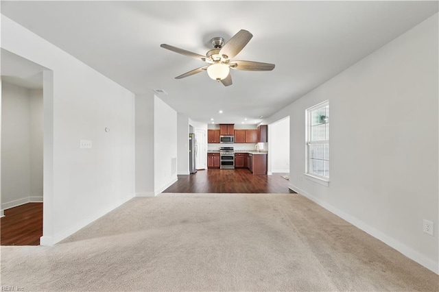 321 Windemere Rd, Newport News, VA 23602 - unfurnished living room with dark carpet, ceiling fan, baseboards, and recessed lighting