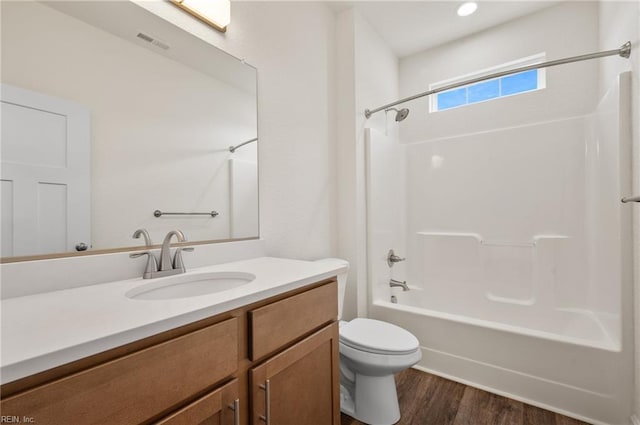 104 Pailin Creek Rd, Elizabeth City, NC 27909 - bathroom with vanity, toilet, wood finished floors, and  shower combination