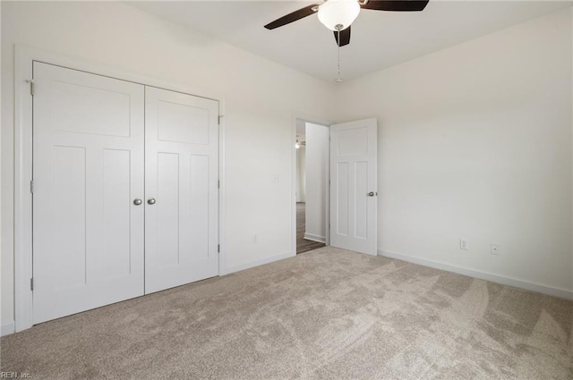 104 Pailin Creek Rd, Elizabeth City, NC 27909 - unfurnished bedroom with carpet flooring, baseboards, a closet, and a ceiling fan