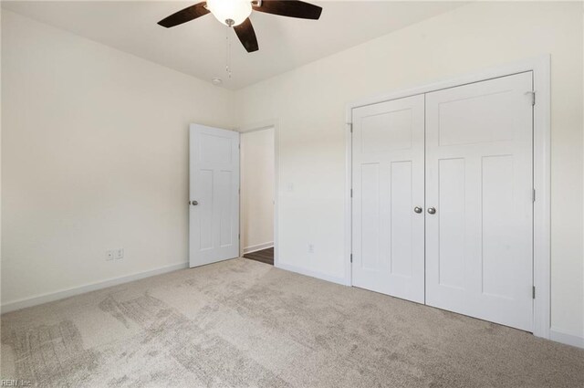 104 Pailin Creek Rd, Elizabeth City, NC 27909 - unfurnished bedroom with carpet floors, baseboards, a closet, and ceiling fan