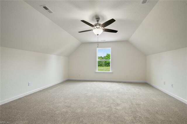 104 Pailin Creek Rd, Elizabeth City, NC 27909 - additional living space with light colored carpet, vaulted ceiling, baseboards, and a ceiling fan