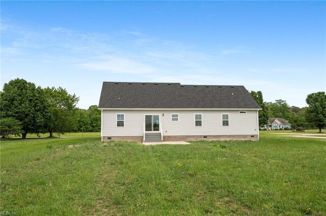 104 Pailin Creek Rd, Elizabeth City, NC 27909 - rear view of property with crawl space, a yard, a shingled roof, and a patio area