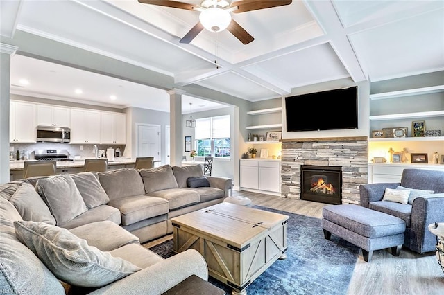 3820 Whites Lndg, Chesapeake, VA 23321 - living area with wood finished floors, a ceiling fan, ornate columns, crown molding, and beam ceiling